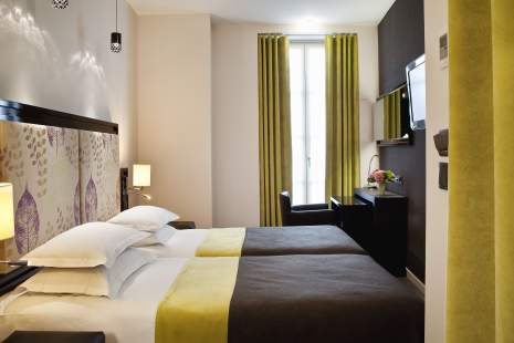 
                        巴黎卡隆酒店双人床客房图片
                    